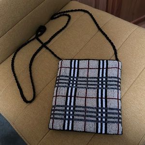 Beaded ( both sides) handbag in a Burberry matching print. Not a real Burberry.